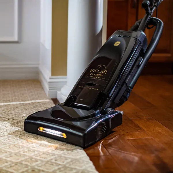 Vacuuming wood floors and carpet with the Riccar R25 Pet Premium Vacuum