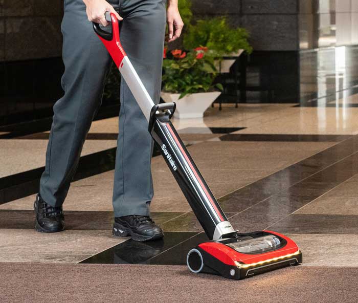 Sanitaire Vacuuming floor