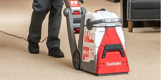 Cleaning carpet with Sanitaire carpet cleaner rental from Stark's Vacuums in Portland OR